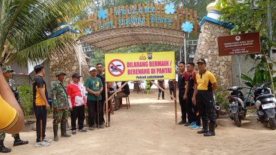 Kapolsek Sokobanah Berikan Himbauan  Larangan Supaya Anak Kecil Tidak Berenang Di PantaiLonMalang